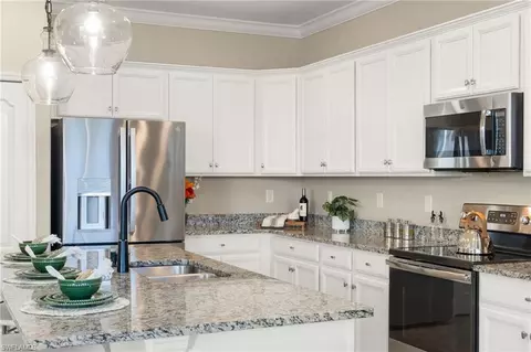 Kitchen - 9258 Shadow Oak Ln, Naples, FL 34120 photo 2 of 4