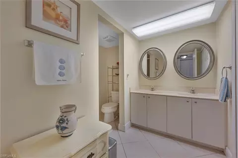 Bath - 215 Cypress Way E #C4, Naples, FL 34110 photo 1 of 2