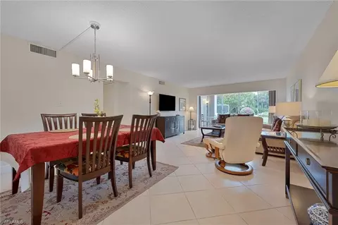 Dining - 215 Cypress Way E #C4, Naples, FL 34110 photo 1 of 2