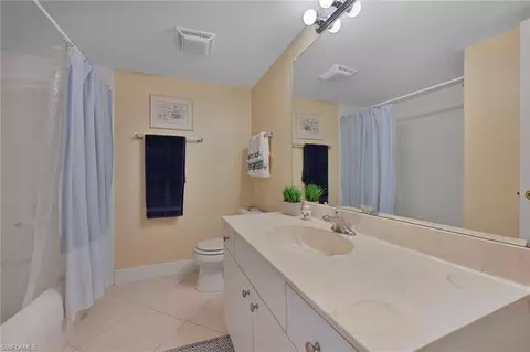 Bath - 215 Cypress Way E #C4, Naples, FL 34110 photo 2 of 2