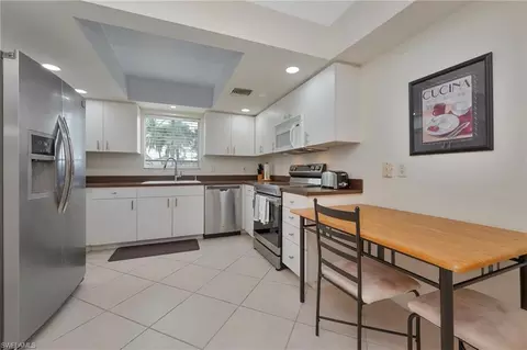 Kitchen - 215 Cypress Way E #C4, Naples, FL 34110 photo 1 of 2