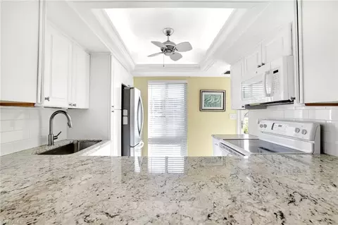 Kitchen - 147 Harrison Rd #1, Naples, FL 34112 photo 3 of 3