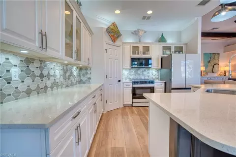 Kitchen - 6977 Bent Grass Dr, Naples, FL 34113 photo 2 of 3