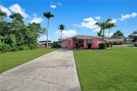 Exterior - 101 Pago Pago Dr E, Naples, FL 34113 photo 4 of 8
