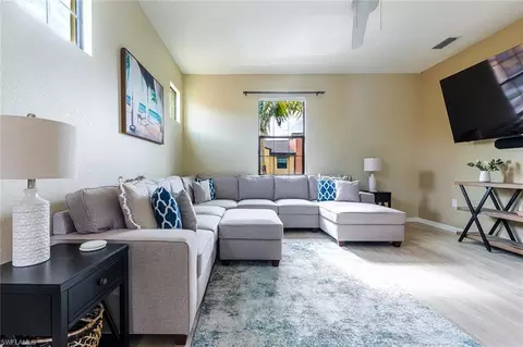 Living - 9077 Capistrano St N #4702, Naples, FL 34113 photo 2 of 3
