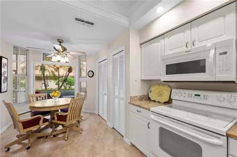 Kitchen - 8015 Tiger Cv #204, Naples, FL 34113 photo 4 of 4