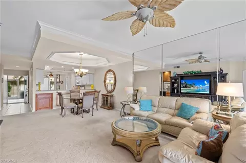 Living - 8015 Tiger Cv #204, Naples, FL 34113 photo 2 of 3