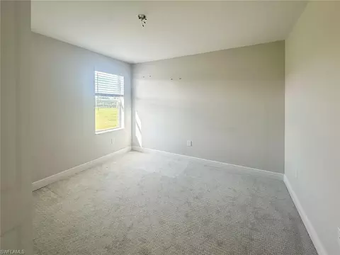 Bedroom - 4605 Centaurus Cir, Naples, FL 34120 photo 5 of 6
