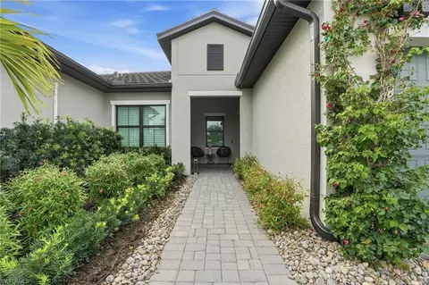 Exterior - 14708 Kingfisher Loop, Naples, FL 34120 photo 2 of 9