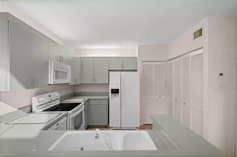 Kitchen - 71 Emerald Woods Dr #F2, Naples, FL 34108 photo 2 of 3
