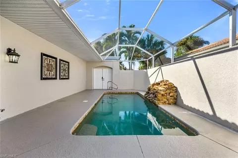 Exterior - 104 Glen Eagle Cir, Naples, FL 34104 photo 4 of 8