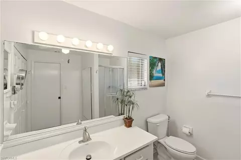 Bath - 215 Cypress Way E #E3, Naples, FL 34110 photo 1 of 3