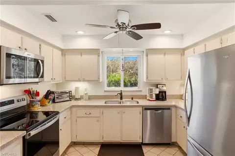 Kitchen - 215 Cypress Way E #E3, Naples, FL 34110 photo 5 of 5