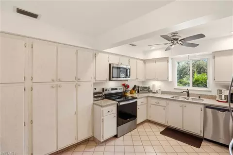 Kitchen - 215 Cypress Way E #E3, Naples, FL 34110 photo 1 of 5