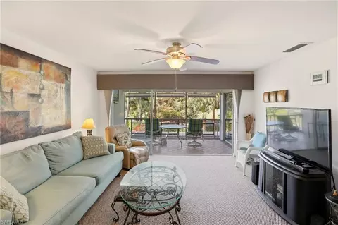 Living - 215 Cypress Way E #E3, Naples, FL 34110 photo 1 of 5
