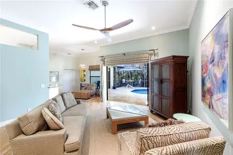 Living - 302 Sawgrass Ct, Naples, FL 34110 photo 3 of 3