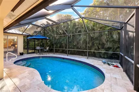 Exterior - 302 Sawgrass Ct, Naples, FL 34110 photo 2 of 5