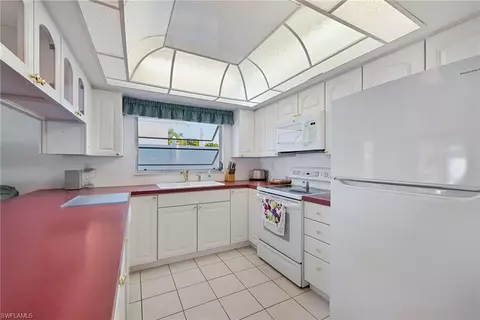 Kitchen - 693 95th Ave N, Naples, FL 34108 photo 1 of 2