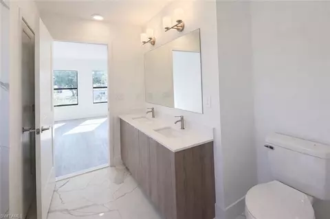 Bath - 1608 Gene Ave S, Lehigh Acres, FL 33976 photo 2 of 4