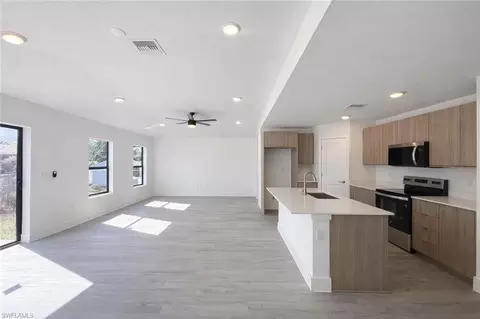 Living - 1608 Gene Ave S, Lehigh Acres, FL 33976 photo 1 of 3