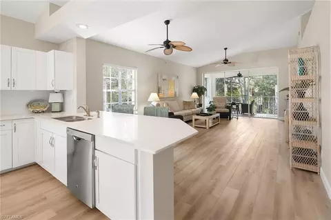 675 Wiggins Lake Dr #201, Naples, FL 34110