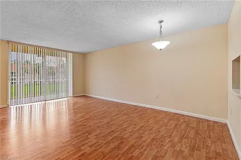 225 Turtle Lake Ct #209, Naples, FL 34105