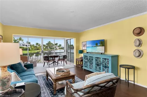 Living - 4150 Crayton Rd #B6, Naples, FL 34103 photo 2 of 3