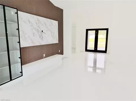 Living - 1107 Chaplin Ave, Lehigh Acres, FL 33971 photo 4 of 5