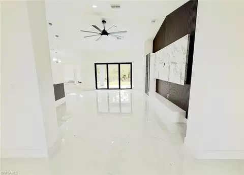 Living - 1107 Chaplin Ave, Lehigh Acres, FL 33971 photo 2 of 5