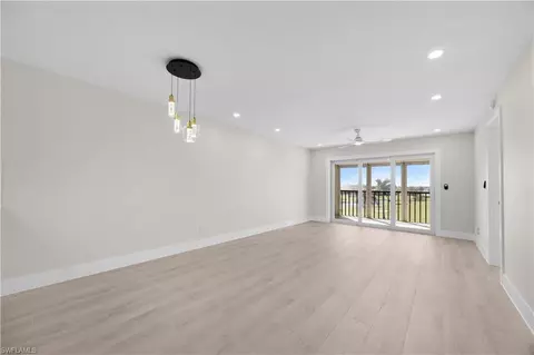 Living - 21 High Point Cir E #409, Naples, FL 34103 photo 2 of 2