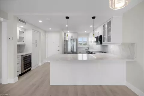 Kitchen - 21 High Point Cir E #409, Naples, FL 34103 photo 3 of 6