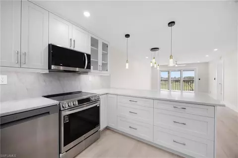 Kitchen - 21 High Point Cir E #409, Naples, FL 34103 photo 6 of 6