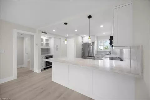 Kitchen - 21 High Point Cir E #409, Naples, FL 34103 photo 2 of 6