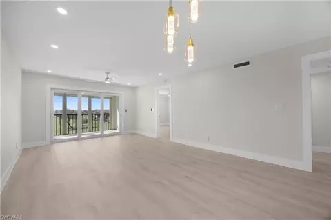 Living - 21 High Point Cir E #409, Naples, FL 34103 photo 1 of 2