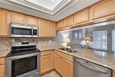 Kitchen - 5899 Chanteclair Dr #211, Naples, FL 34108 photo 2 of 2