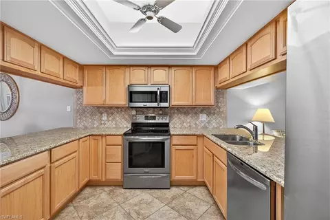 Kitchen - 5899 Chanteclair Dr #211, Naples, FL 34108 photo 1 of 2
