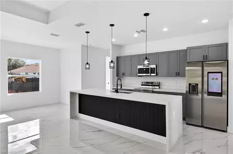 Kitchen - 1402 E 7th St, Lehigh Acres, FL 33972 photo 2 of 3