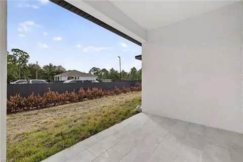 Exterior - 1402 E 7th St, Lehigh Acres, FL 33972 photo 4 of 5