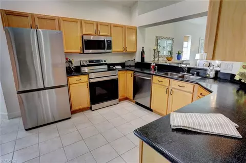 Kitchen - 486 Edgemere Way E #2, Naples, FL 34105 photo 1 of 3
