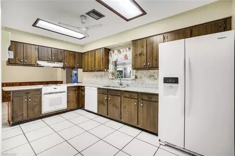 Kitchen - 5290 Cypress Ln, Naples, FL 34113 photo 2 of 3