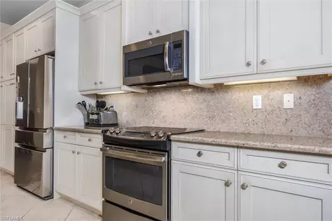 Kitchen - 3296 Pacific Dr, Naples, FL 34119 photo 1 of 3