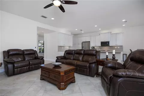 Living - 3296 Pacific Dr, Naples, FL 34119 photo 2 of 3