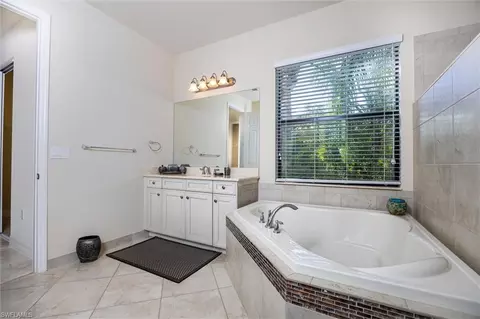 Bath - 3296 Pacific Dr, Naples, FL 34119 photo 2 of 7