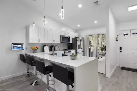 Kitchen - 4100 Looking Glass Ln #3002, Naples, FL 34112 photo 3 of 5