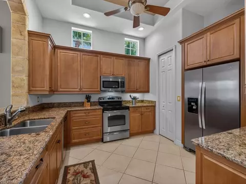 Kitchen - 5757 Mango Cir, Naples, FL 34110 photo 1 of 2