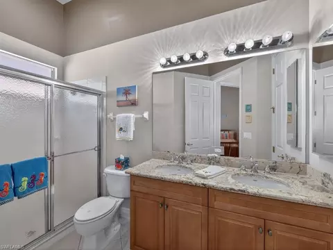 Bath - 5757 Mango Cir, Naples, FL 34110 photo 2 of 2