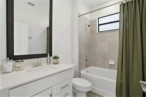 Bath - 18579 Ives Dr, Estero, FL 33928 photo 5 of 5