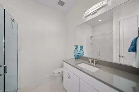 Bath - 8785 Cavano St E, Naples, FL 34119 photo 3 of 4