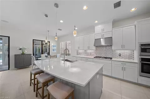 Kitchen - 8785 Cavano St E, Naples, FL 34119 photo 2 of 3