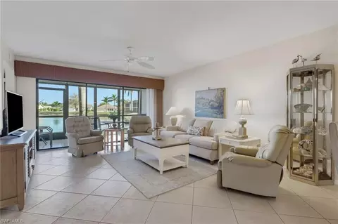 Living - 4310 Chantelle Dr #E102, Naples, FL 34112 photo 2 of 3